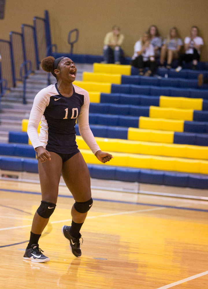 Timia Grant celebrates Wake Tech's victory over DCCC, 3 sets to 0 on Tuesday, August 22, 2017.